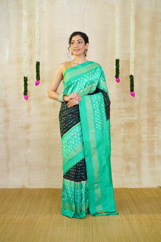 Black Pochampally Pure Silk Saree with Mint Green Tissue Border & White-Green Motifs